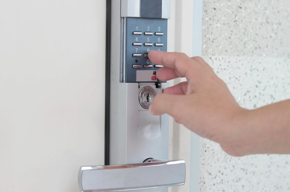 An image of a security keypad lock on an apartment door